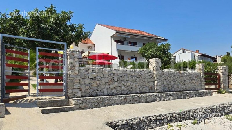 Čiovo – House with a swimming pool by the sea with access to the beach